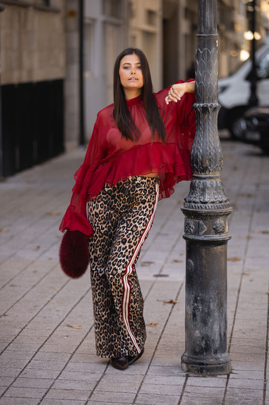 Calça leopardo c/ risca vermelha