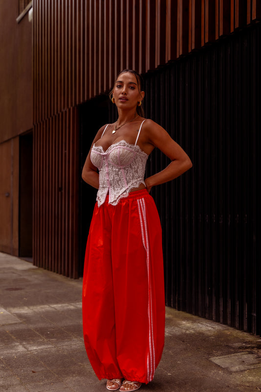 Calça c/riscas laterais - Laranja