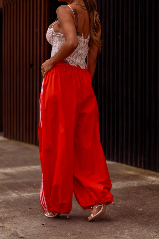 Calça c/riscas laterais - Laranja