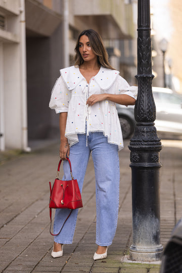 Calça de ganga c/ tachas á frente